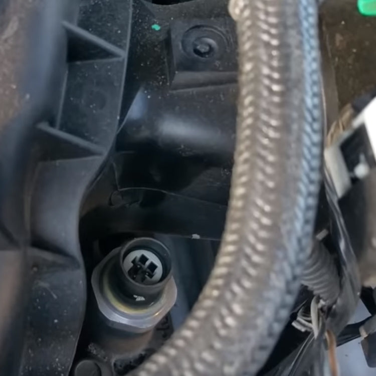 Engine bay oil pressure sensor joint adaptor with black connector and silver fitting