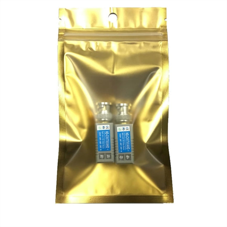Two video balun transceivers sealed in a gold foil protective bag with blue labels