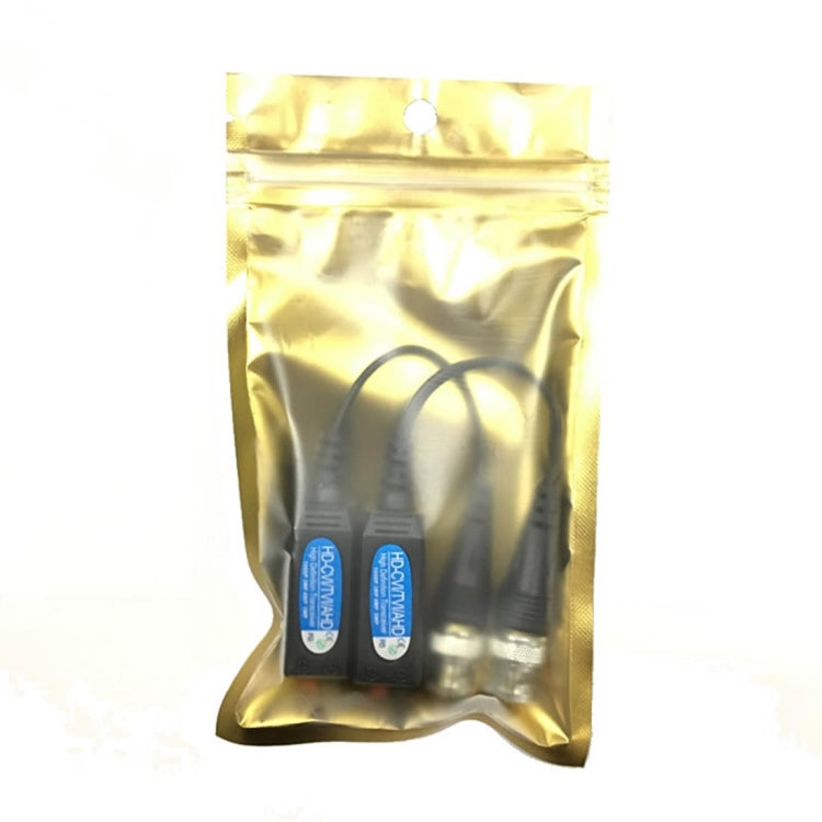 Gold foil pouch with two video balun transceivers, coax and RJ45 ports