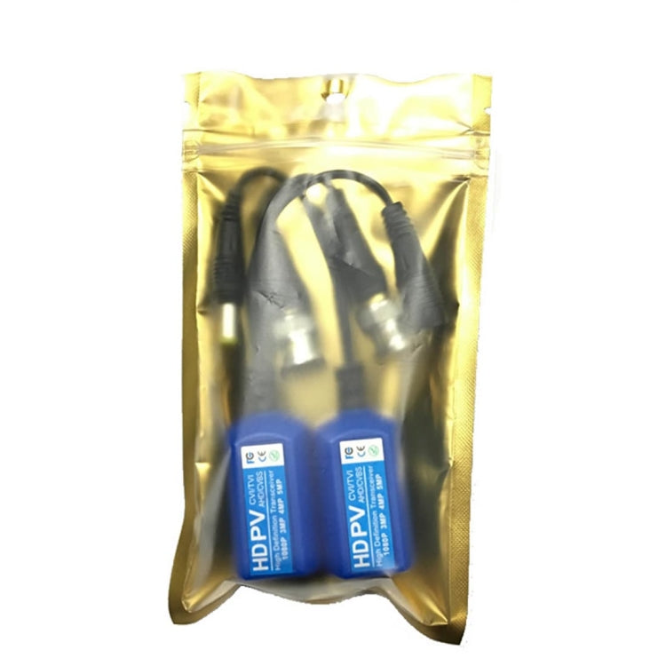 Two blue HD-PV twisted transceiver baluns in a gold foil polybag