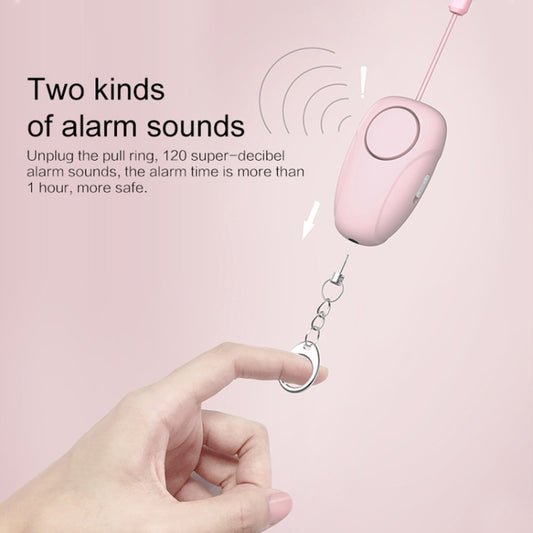 Pink personal alarm siren with pull ring keychain, held in a hand