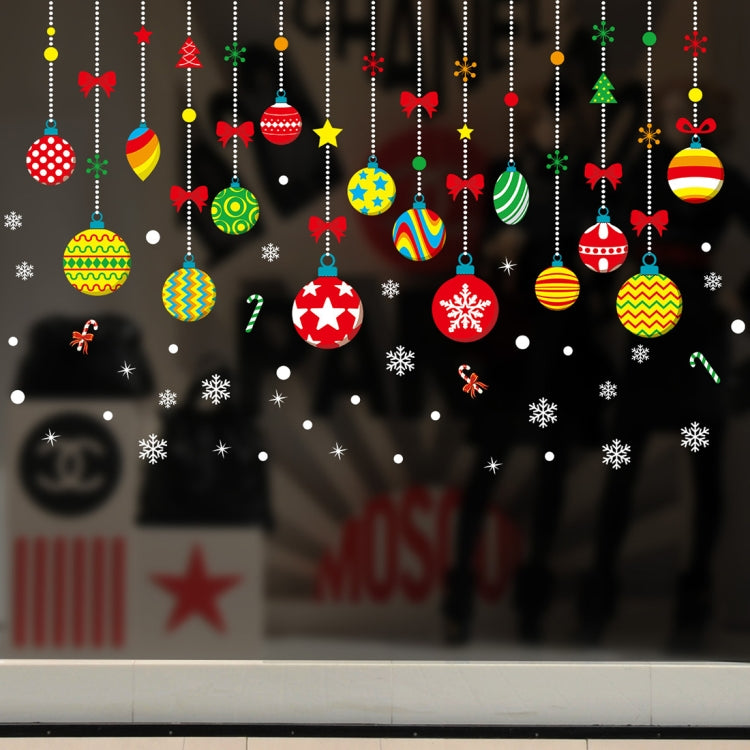 Christmas window sticker with colorful hanging ornaments and scattered snowflakes