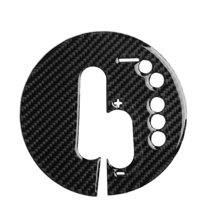 Carbon fiber-look circular shifter panel sticker with shifter slot and right-side cutouts