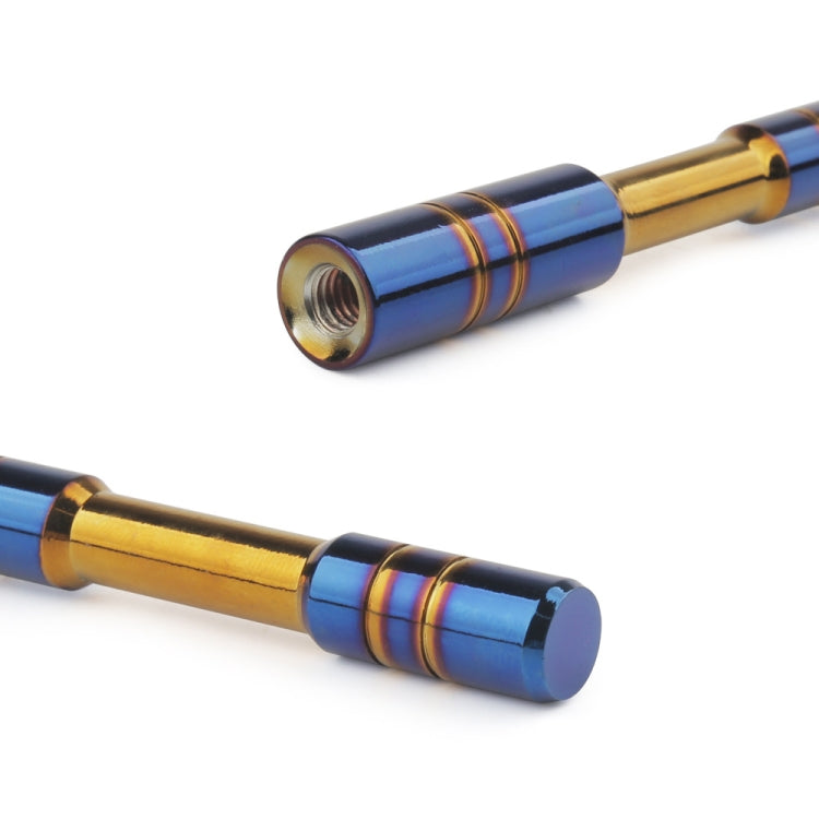 Aluminum car signal antenna close-up with blue body, gold trim, and threaded end