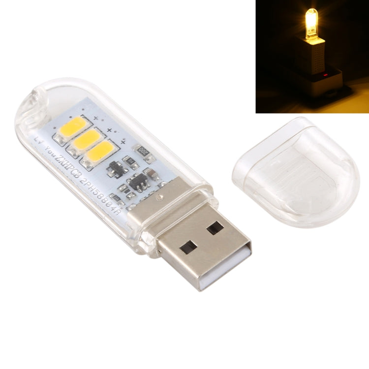 Portable USB LED light with clear housing and plug, showing 3 yellow LEDs on board