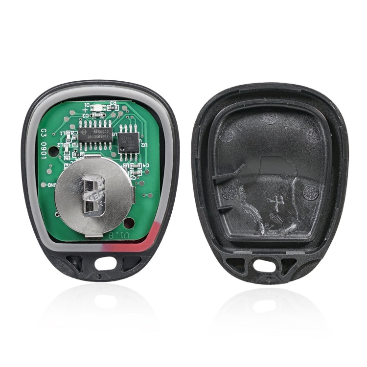 Car key fob interior with green circuit board and metal battery contacts