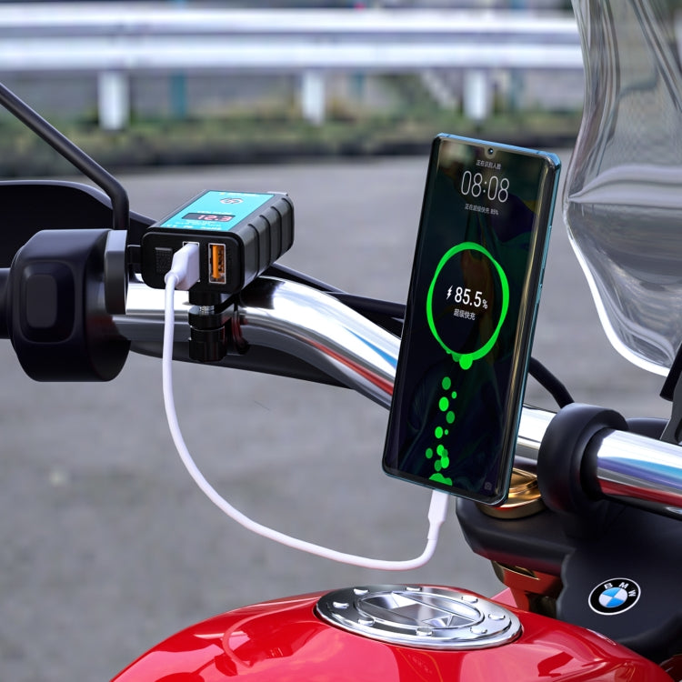 Motorcycle dual USB charger connected to bike handlebar, phone charging with voltmeter