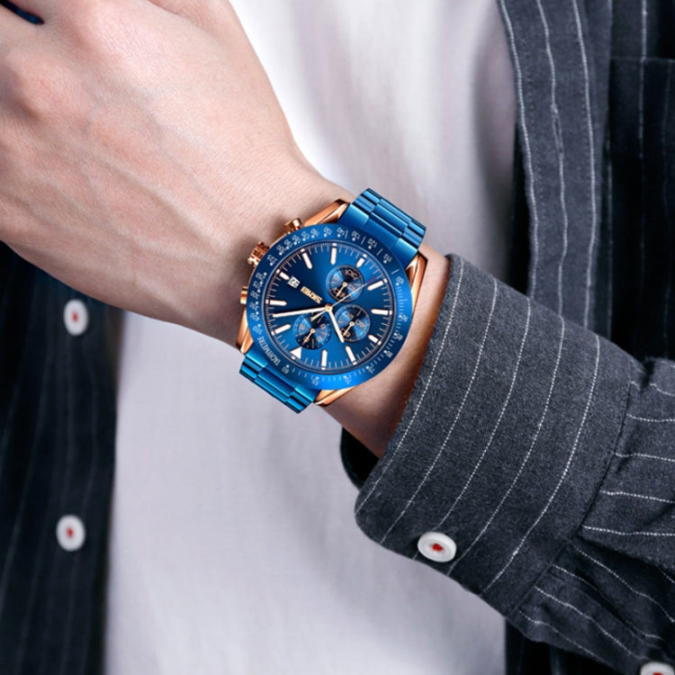 Men’s quartz stopwatch wristwatch worn on wrist: blue dial with blue metal bracelet