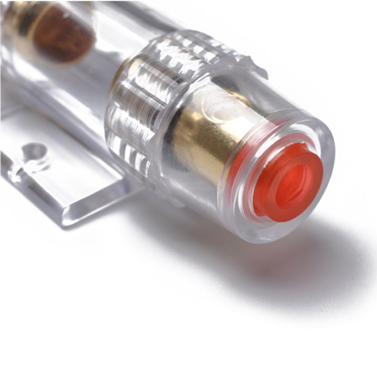 Close-up of inline AGU fuse holder red end cap and gold contact inside clear tube