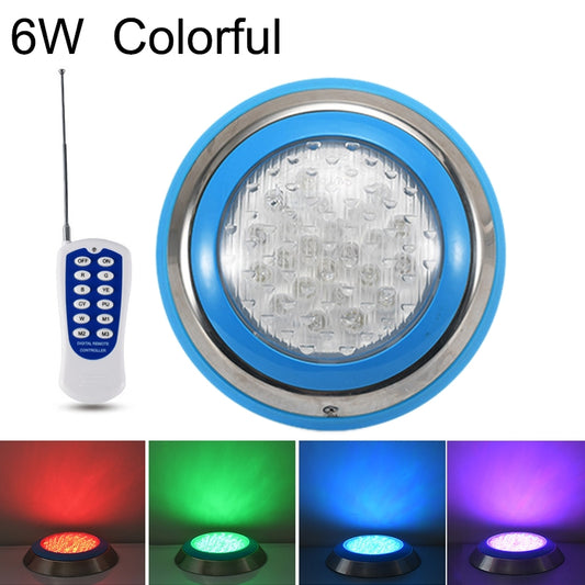 Color-changing LED pool light with stainless face, blue bezel, and color remote control