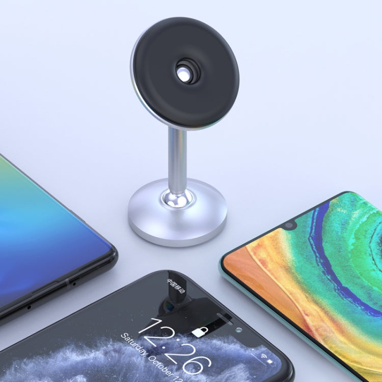 Magnetic phone holder base with round mount disk placed between phones