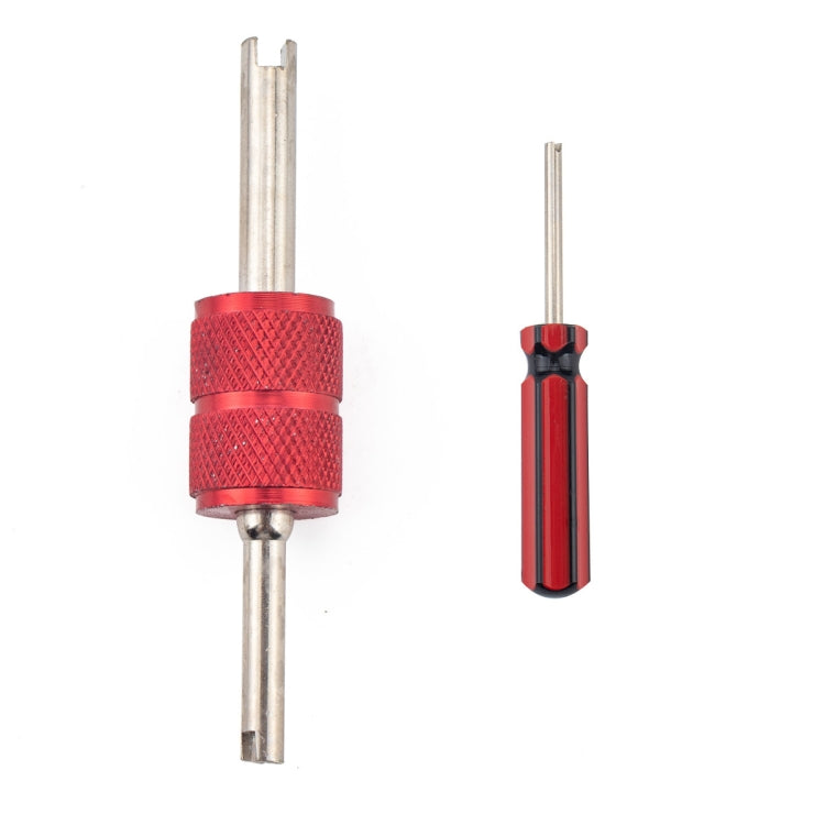 Red-and-silver tire valve removal tool with protective red sleeve and metal rod