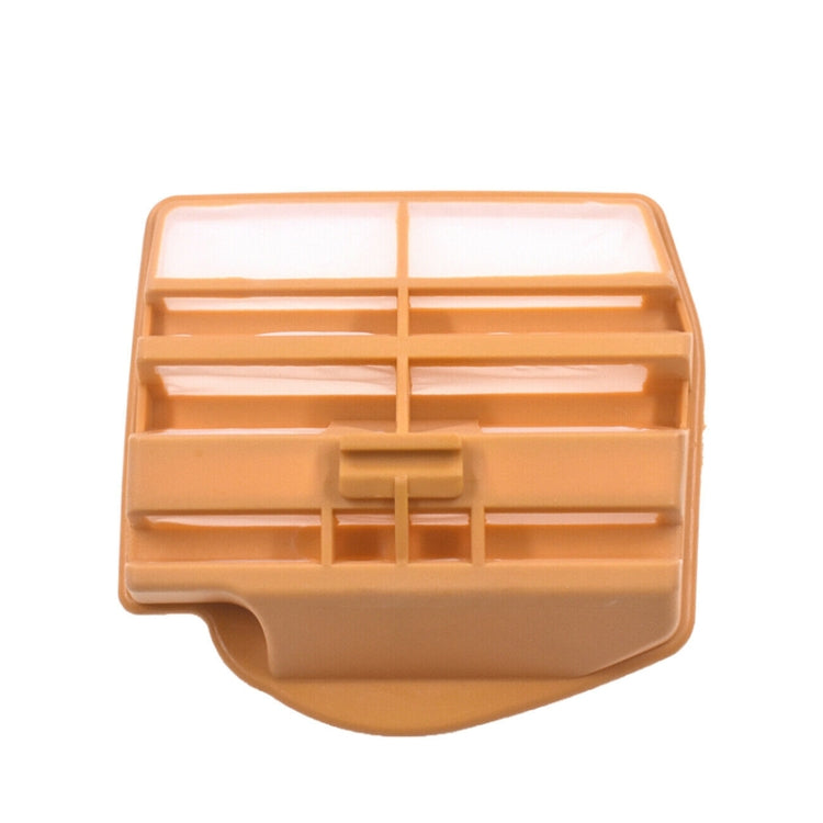 Chainsaw air filter element with orange frame and white filter media, underside view.