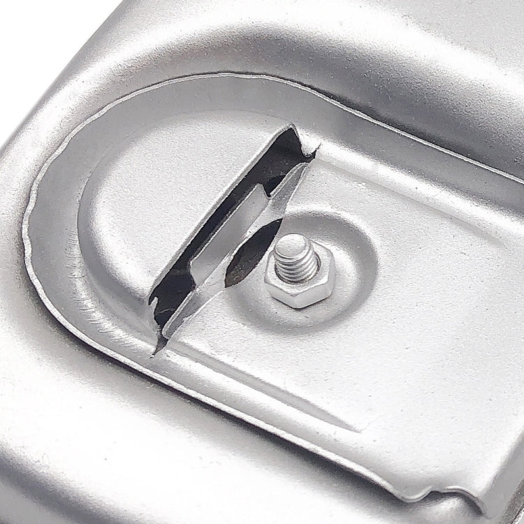 Chainsaw exhaust muffler cover close-up with bolt and latch bracket
