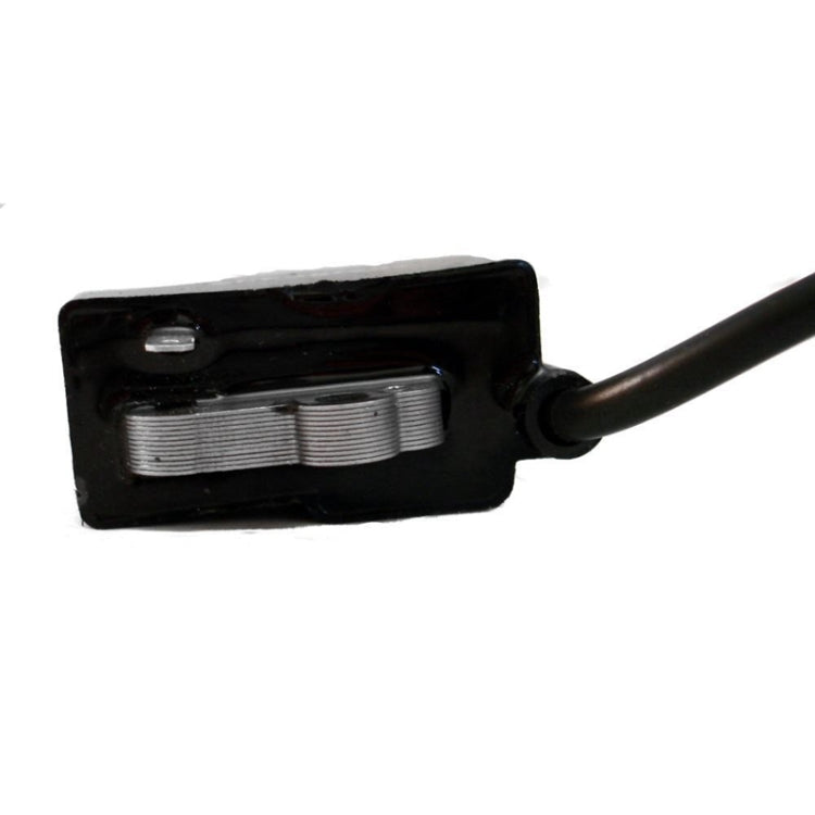 Ignition coil housing with metal contacts and black wire lead