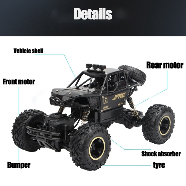Black RC off-road vehicle with labeled parts: front motor, rear motor, bumper, and shocks