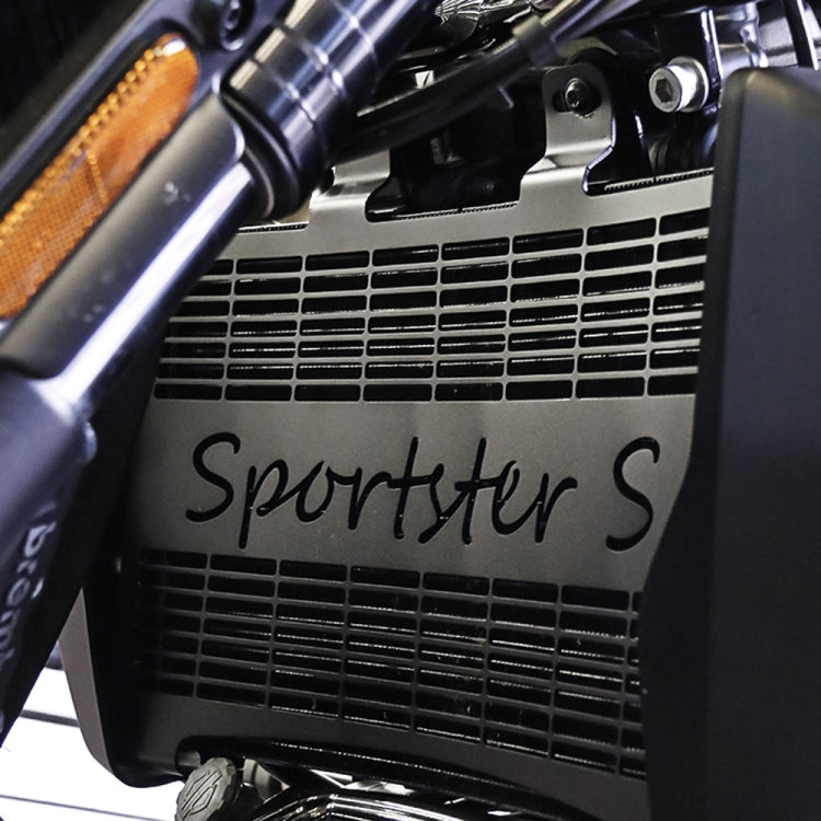 Black radiator grille guard installed with vent slots and “Sportster S” text
