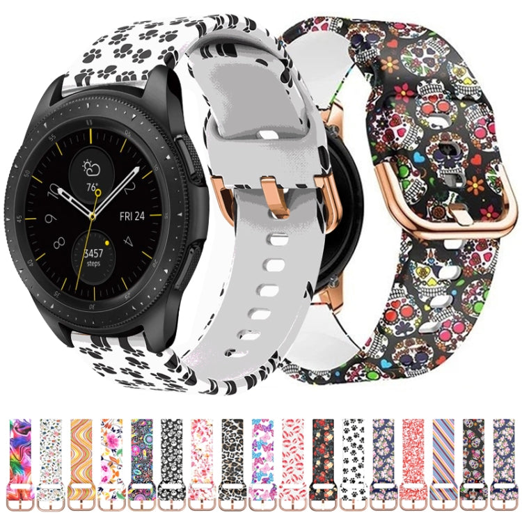 Silicone watch strap with paw-print and skull-print, shown on a smartwatch.