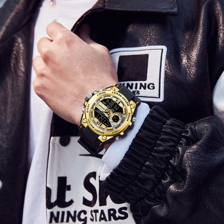 Gold-tone dual-time sports watch with luminous display and black silicone strap