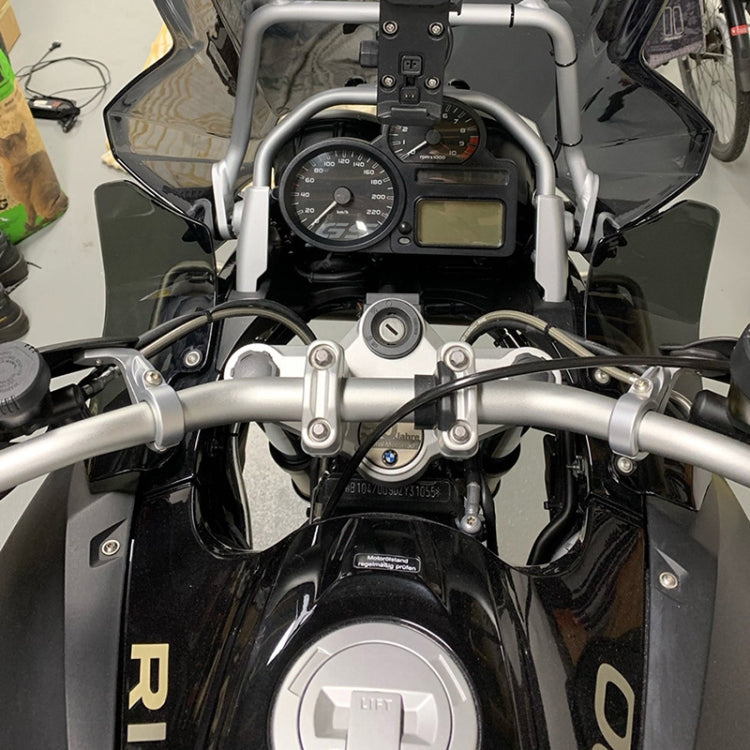 Motorcycle with installed side windshields, dark tinted panels on handlebars