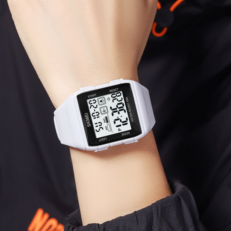 SKMEI 1960 digital electronic watch on wrist with white silicone strap and square LCD