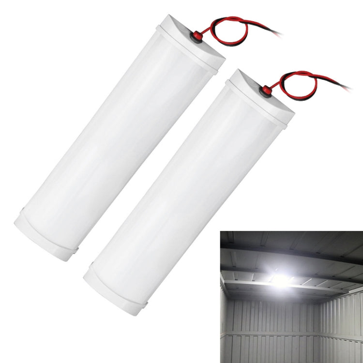 Pair of white cylindrical LED light bars with attached red/black wiring