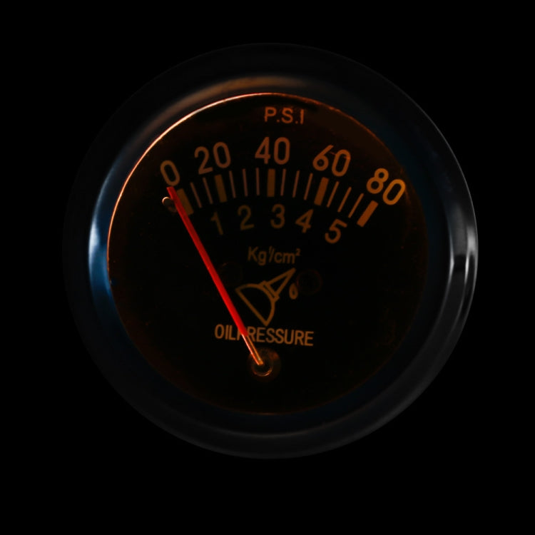 Backlit mechanical oil pressure gauge with orange PSI and kg/cm² markings, red needle