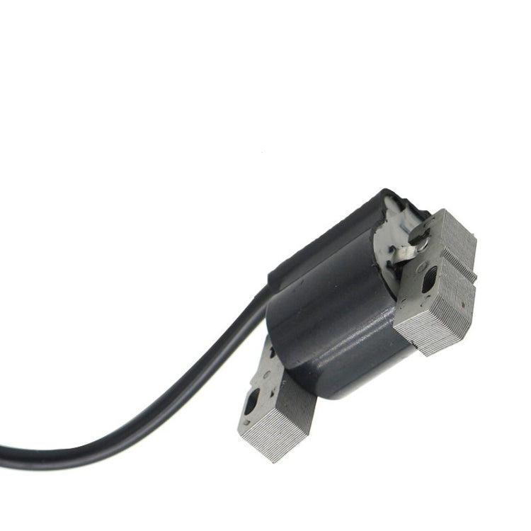 Ignition coil module with black body, two metal plates, and black wire lead