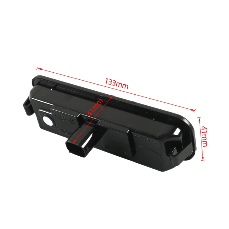 Black trunk door switch with light lens, shown with size diagram and arrows