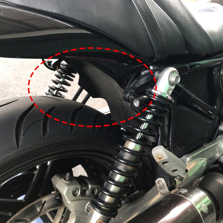 Mounted mini LED motorcycle turn signal in black metal with amber lens and wiring