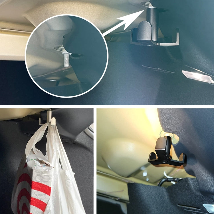 Car trunk area organizer hook holding a plastic shopping bag