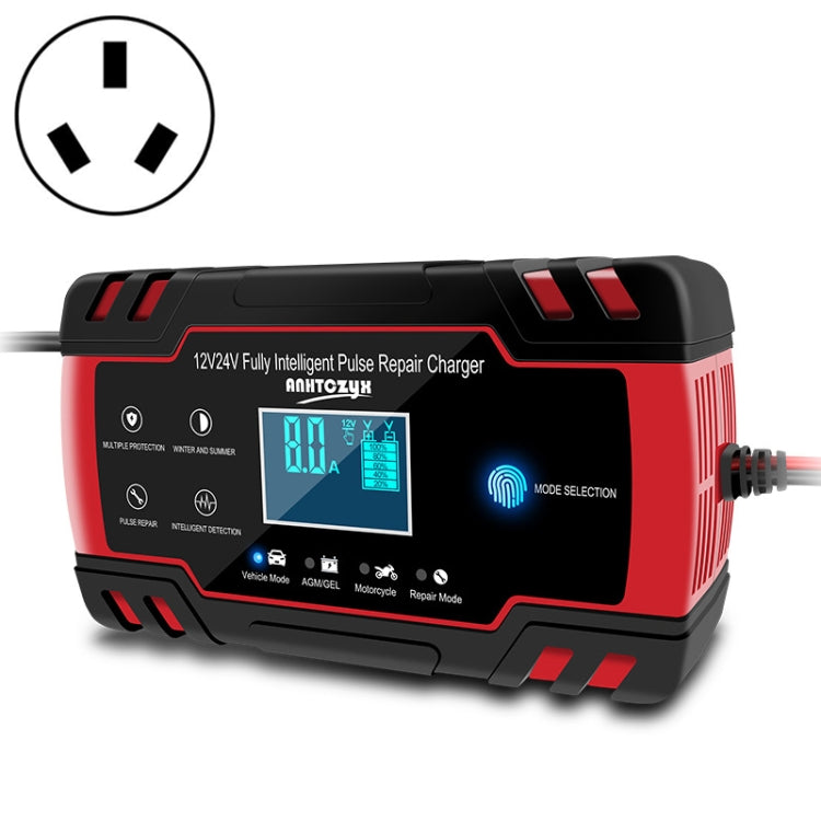 Red and black battery charger with cable and angled three-prong plug symbol