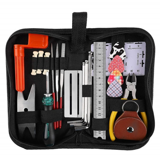 Guitar repair tool set in zip bag with file, ruler, pliers, and winding tool