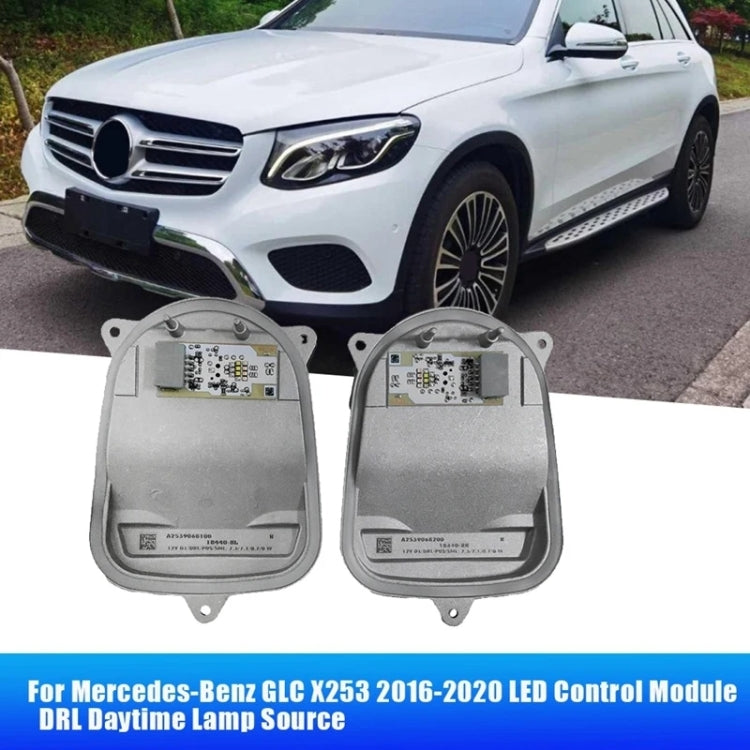 Pair of LED daytime lamp control modules, silver metal housings with circuit boards.