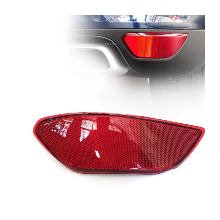Left rear bumper reflector, red lens mounted in gray bumper cutout