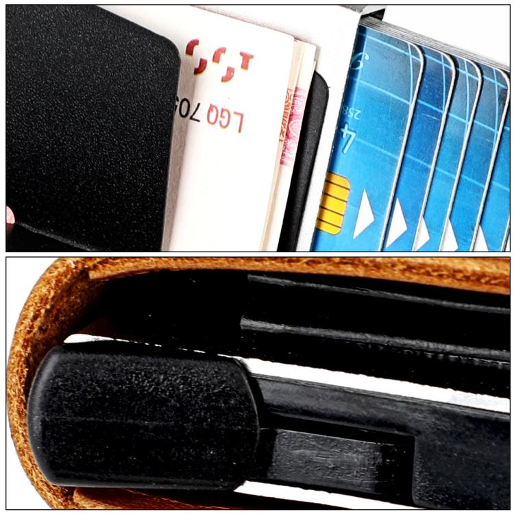 Brown leather card holder interior with black tray and card slots.