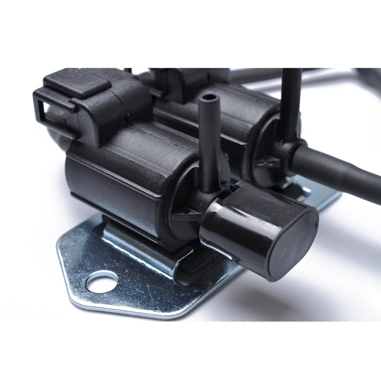 Car solenoid valve with metal mounting bracket and black electrical plug
