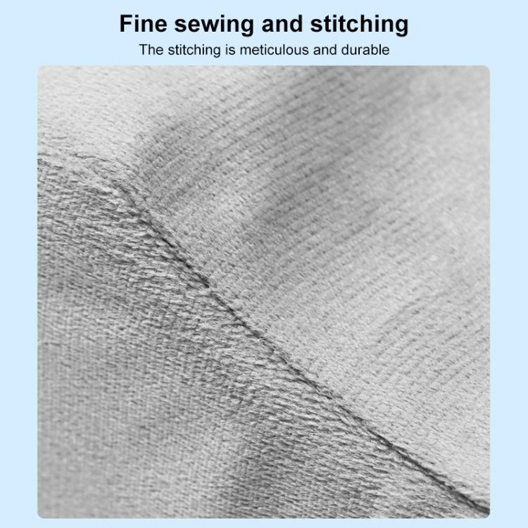 Gray knee support pad pillow, close-up of textured fabric with reinforced stitching