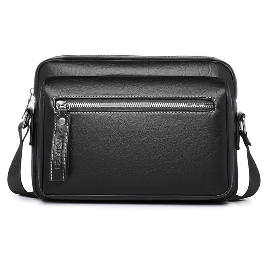 Men's black PU leather crossbody bag with front zipper and adjustable shoulder strap