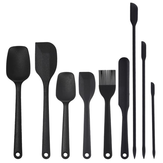 Black silicone baking utensil set with spatula, brush, and scraper heads