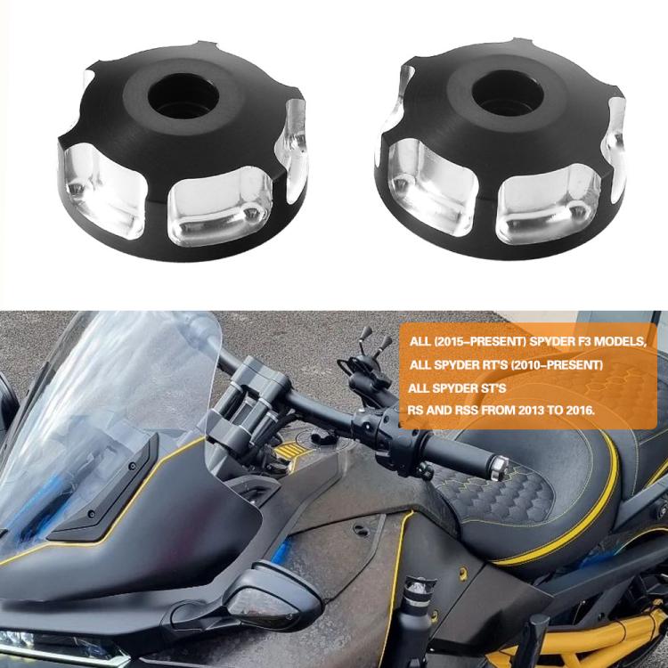 Installed motorcycle handlebar end caps in black with silver trim