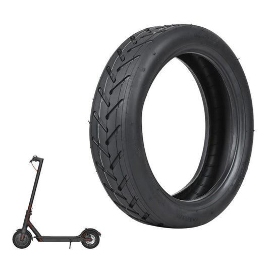 Black 8.5-inch tubeless scooter tire with deep tread, angled view