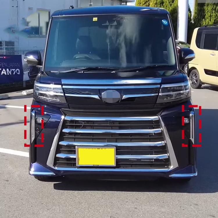 Installed chrome rear bumper fog light trim bezels with rectangular openings