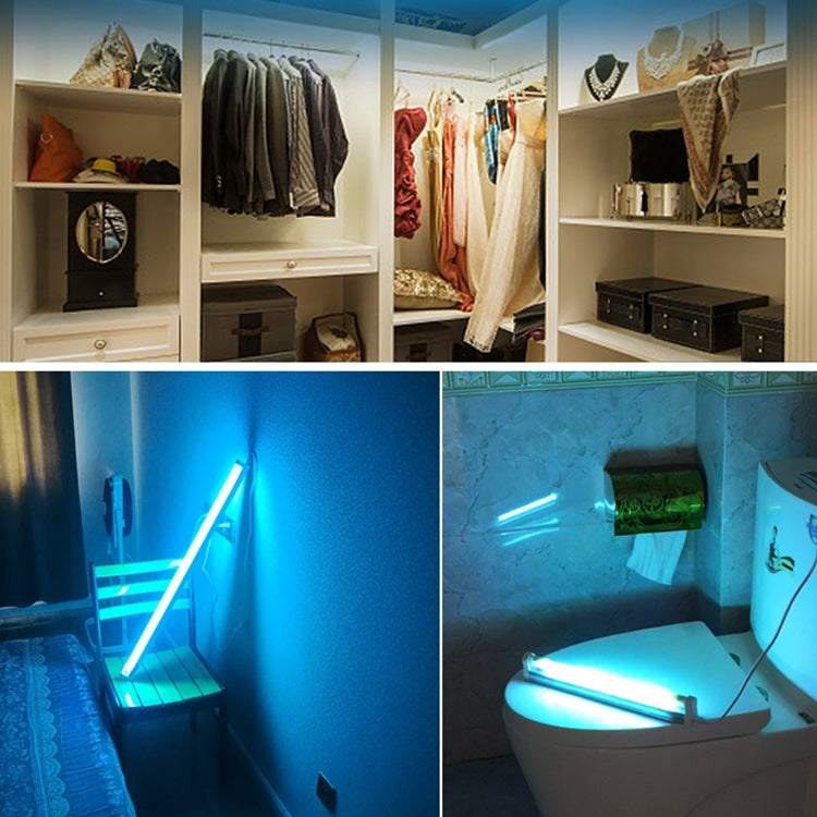 Portable UVC disinfection lamp glowing tube used in a closet and bathroom