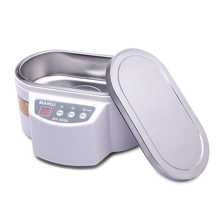 White ultrasonic cleaner with lid open, stainless steel basin, and LCD control panel.