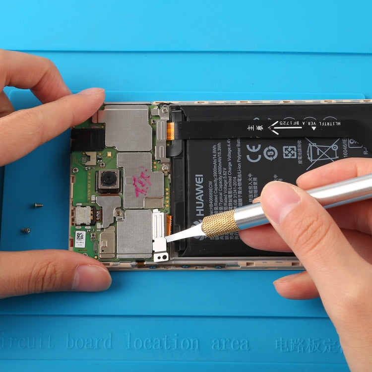 BGA repair scraper tool used on a smartphone circuit board