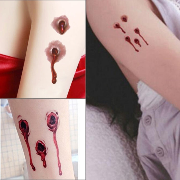 Temporary bullet wound blood tattoo stickers applied on skin in realistic red details