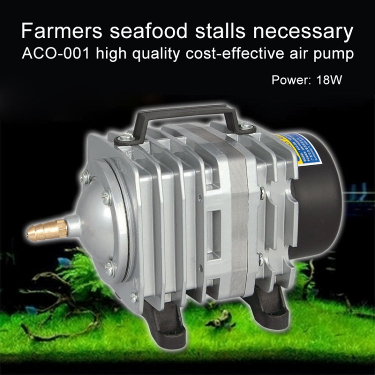 Air pump compressor with silver cooling fins, black base feet, and brass inlet fitting