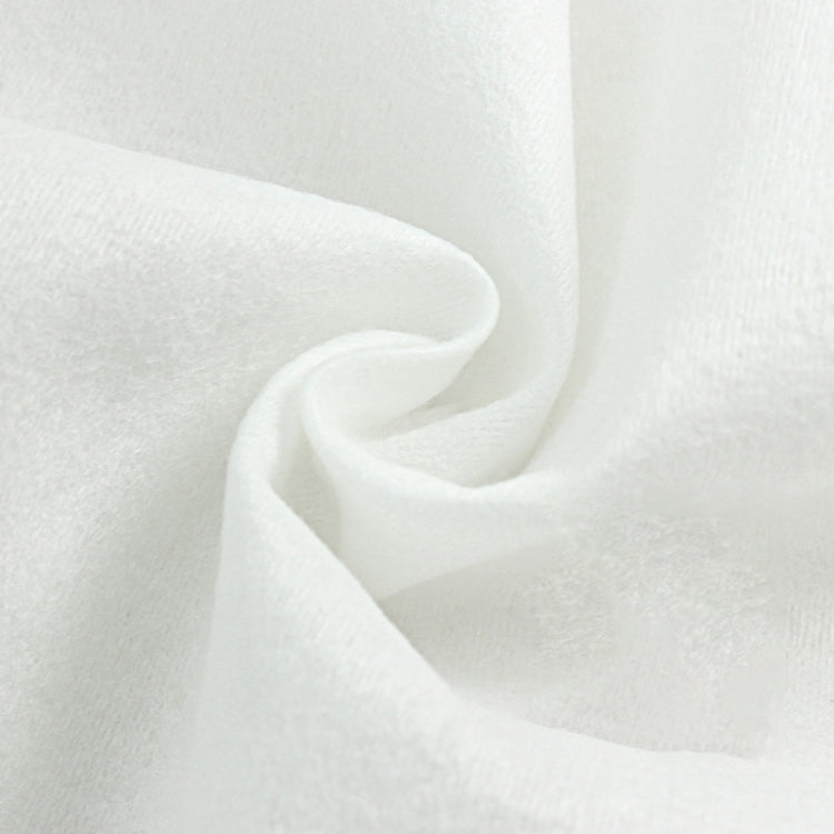 White cotton disposable cleansing towel with soft textured surface