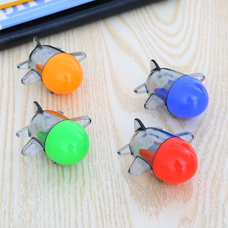Aircraft-style pencil sharpeners set, showing orange, green, blue, and red bodies